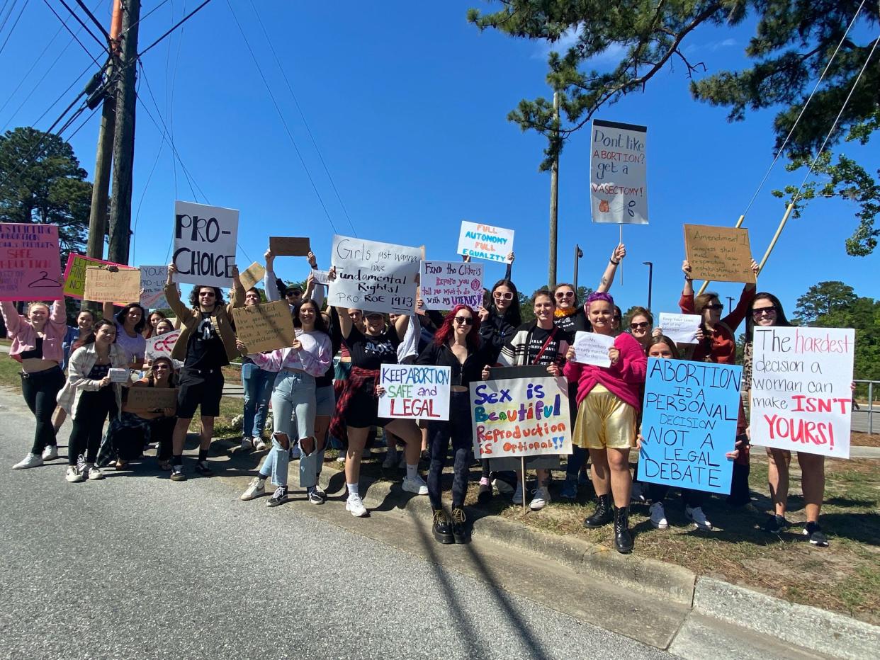 Activists protest the Supreme Court's potential overturning of Roe V. Wade, which protects a woman's right to have an abortion, on 17th Street in Wilmington. They hope to convince local leaders to enact laws and/or policies that would protect and/or support women in New Hanover County who choose to have an abortion.