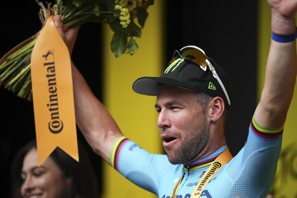 Britain's sprinter Mark Cavendish celebrates his record 35th Tour de France stage win to break the record of Belgian legend Eddy Merckx in the fifth stage of the Tour de France cycling race over 177.4 kilometers (110.2 miles) with start in Saint-Jean-de-Maurienne and finish in Saint-Vulbas, France, Wednesday, July 3, 2024. (AP Photo/Daniel Cole)