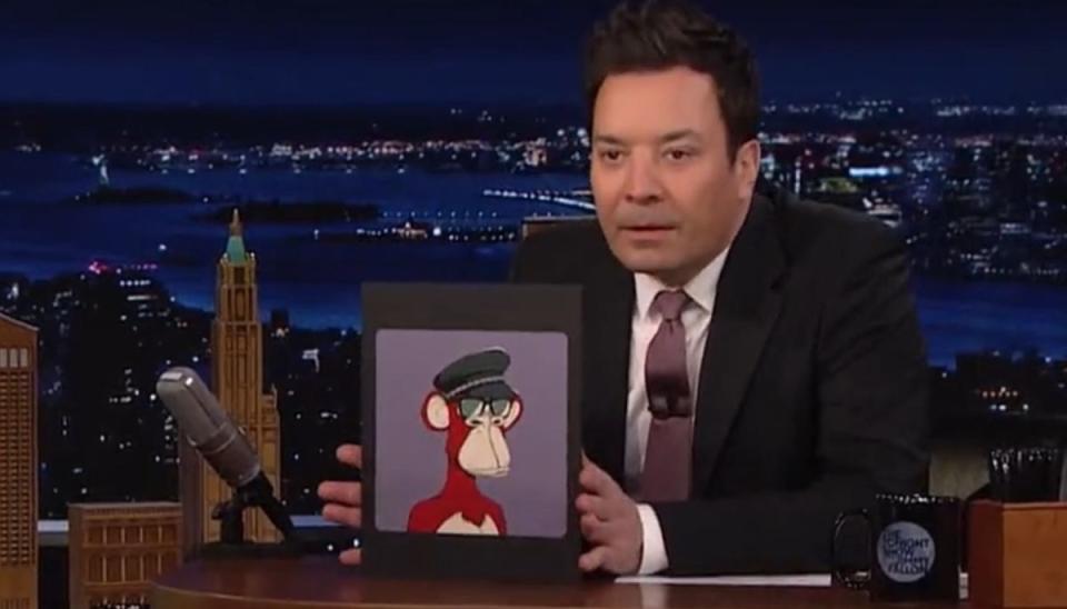 jimmy fallon holding up a bored ape nft