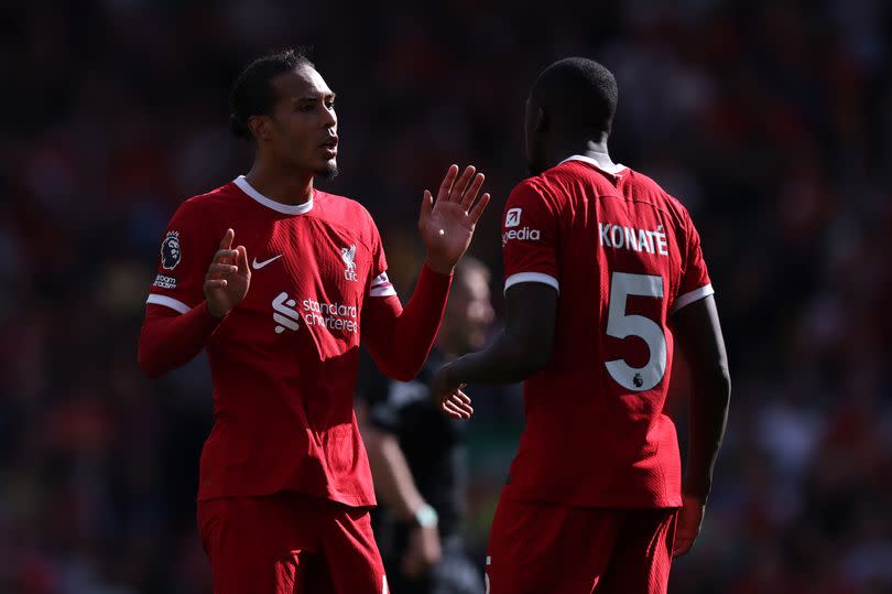 Virgil van Dijk and Ibrahima Konate react during the Premier League match between Liverpool FC and AFC Bournemouth at Anfield on August 19, 2023