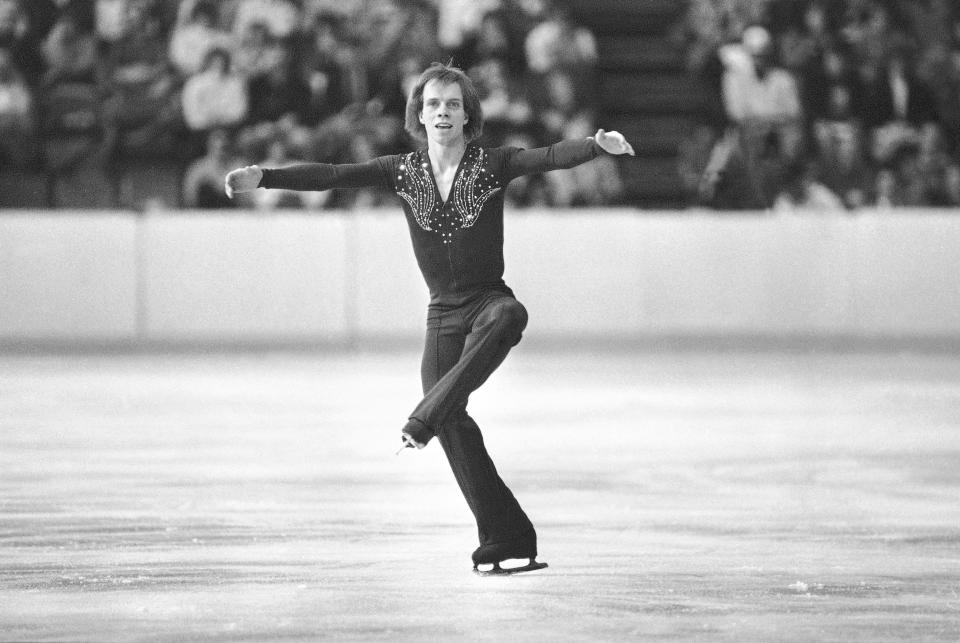 FILE - In this Feb. 19, 1980, file photo, Scott Hamilton, of Haverford, Pa., performs during his short program of the Olympic figure skating event in Lake Placid, N.Y. Hamilton gets goosebumps at the mention of Lake Placid. (AP Photo)