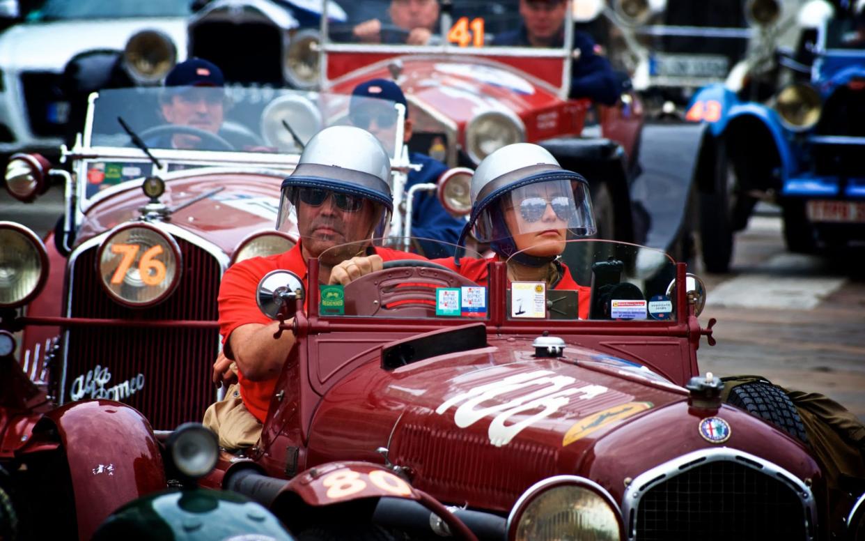 Andreas Pohl (left)pictured in Milan, taking part in the Mille Miglia, in 2018 - Claudio_Marchesi