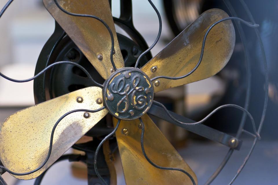 Sarasota, FL, USA – January 30, 2014: Close up of an electric fan from 1905 Made by General Electric, window display of an antique store in Sarasota, Florida, USA.