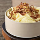 <p>Mashed potatoes look a lot fancier with rings of fried shallots on top, but the crispy garnish is actually a breeze to make.<a href="http://www.foodandwine.com/recipes/mashed-potatoes-with-crispy-shallots" rel="nofollow noopener" target="_blank" data-ylk="slk:Get Food & Wine’s Mashed Potatoes with Crispy Shallots recipe here." class="link rapid-noclick-resp"> <b>Get Food & Wine’s Mashed Potatoes with Crispy Shallots recipe here.</b></a><i> (Photo: Frances Janisch)</i></p>
