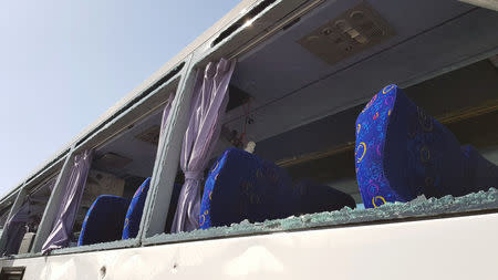 A damaged bus is seen at the site of a blast near a new museum being built close to the Giza pyramids in Cairo, Egypt May 19, 2019. REUTERS/Ahmed Fahmy