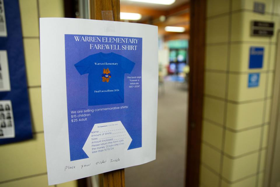 A graphic showing the design of Warren Elementary School's farewell shirt is displayed outside the school's library on Tuesday, May 14, 2024. The school is set to close this summer after the South Bend school board vote last year to close it.