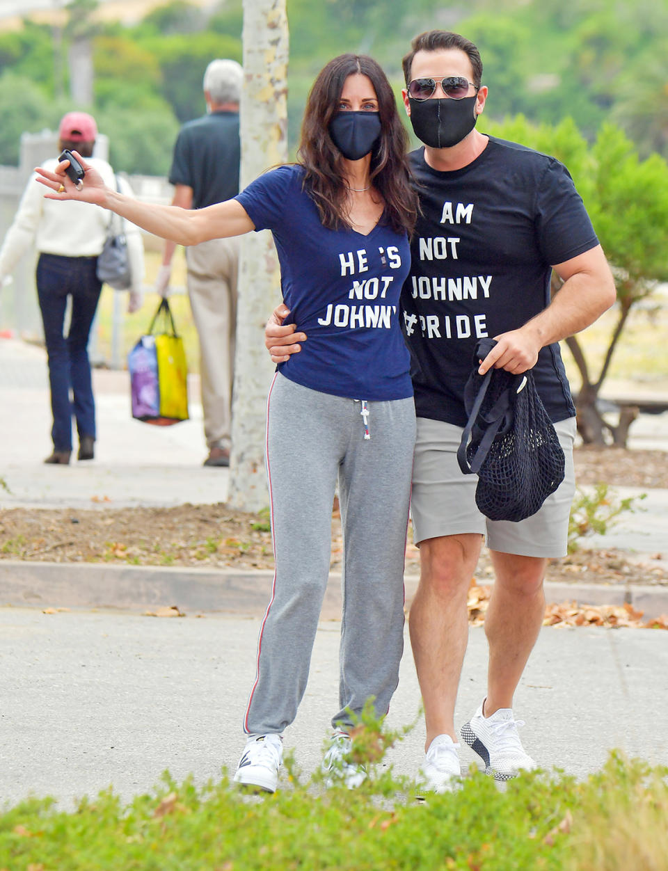 <p>Courteney Cox and her friend wear cheeky shirts in L.A. on Sunday to let everyone know that the <i>Friends</i> star is not hanging out with boyfriend Johnny McDaid, who is currently quarantining in Europe and has been since the start of the pandemic. </p>