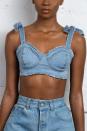 <p><strong>NL The Label</strong></p><p>nlthelabel.com</p><p><strong>$105.00</strong></p><p><a href="https://nlthelabel.com/collections/tops/products/bow-bow-denim-bra-ships-7-1-7-15" rel="nofollow noopener" target="_blank" data-ylk="slk:Shop Now;elm:context_link;itc:0;sec:content-canvas" class="link ">Shop Now</a></p><p>Denim is in the spotlight currently if ya couldn't tell. And if you're a fan of it, you'll love this darling bra top made from the fabric. Wear it with some high-waisted denim for a chic Canadian tuxedo look.</p>