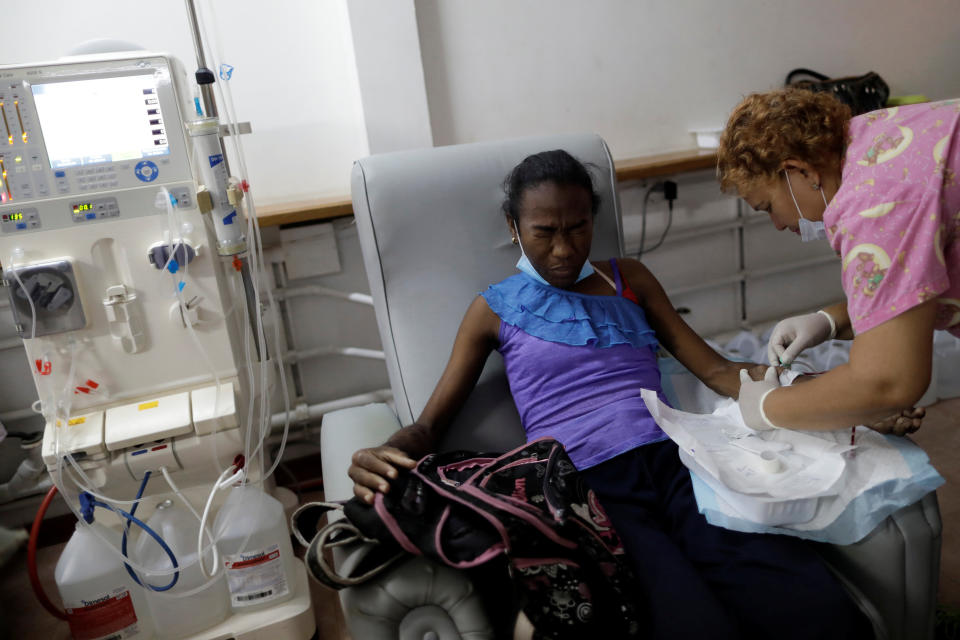 Aidalis Guanipa, 25, a patient with kidney disease, reacts during a dialysis session, after a blackout, at a dialysis center in Maracaibo, Venezuela. (Photo: Ueslei Marcelino/Reuters)