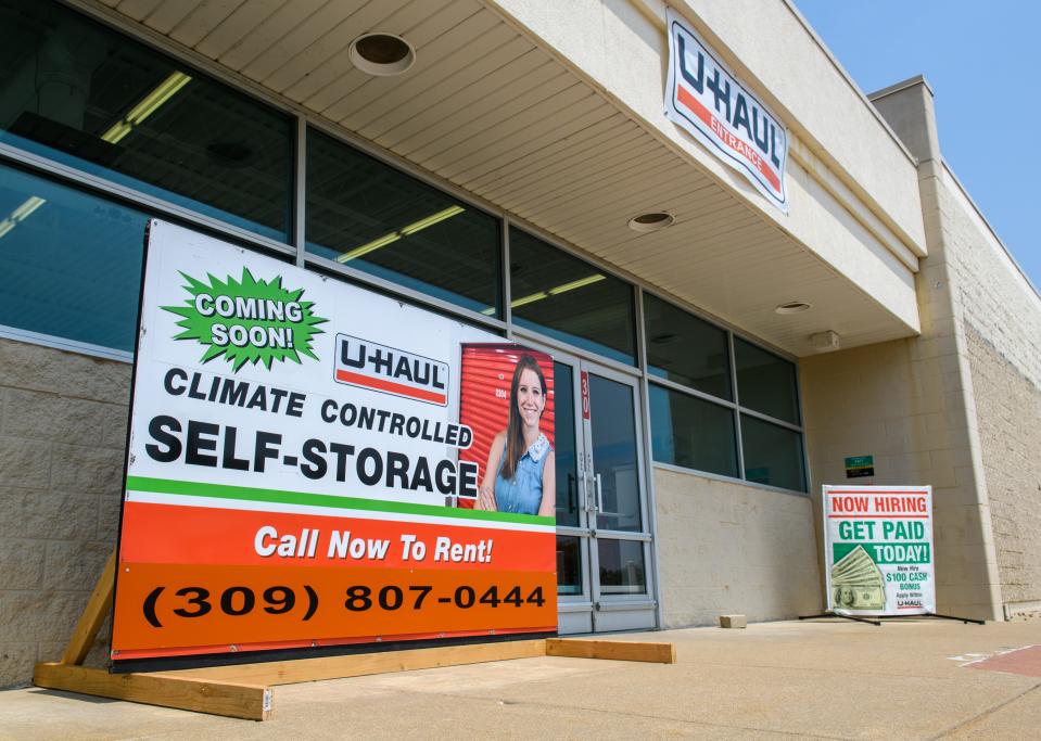 U-Haul currently rents trucks and trailers, boxes and moving supplies, and U-Box portable storage containers out of a temporary space in the former Kmart's lawn and garden department.
