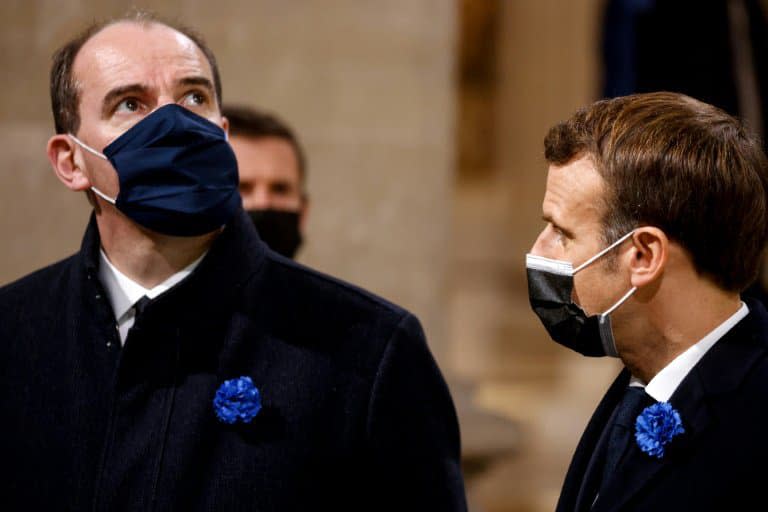 Le Premier ministre franças Jean Castex (g) et le président français Emmanuel Macron le 11 novembre 2020 à Paris - Ludovic MARIN © 2019 AFP