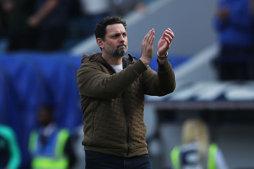 Erol Bulut, manager of Cardiff City, applauds fans after the full-time whistle. -Credit:Huw Evans Picture Agency