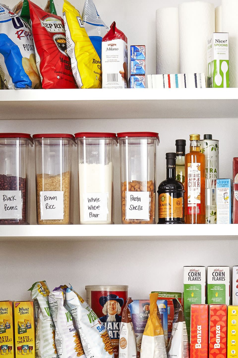 <p>Stock shelves like the grocery store does. By placing the newest boxes, containers, and cans behind the older stuff, you'll use the older food first. Keep stock of what you actually have by placing <a href="https://www.goodhousekeeping.com/health/diet-nutrition/g5147/healthy-canned-foods/" rel="nofollow noopener" target="_blank" data-ylk="slk:dry foods;elm:context_link;itc:0;sec:content-canvas" class="link ">dry foods</a> (including cereals, beans, nuts, and flour) in labeled containers. </p><p><a class="link " href="https://www.amazon.com/Shazo-Storage-Containers-20-Piece-Container/dp/B075MT6GQS/?tag=syn-yahoo-20&ascsubtag=%5Bartid%7C10063.g.36459111%5Bsrc%7Cyahoo-us" rel="nofollow noopener" target="_blank" data-ylk="slk:SHOP STORAGE CONTAINERS;elm:context_link;itc:0;sec:content-canvas">SHOP STORAGE CONTAINERS</a></p>