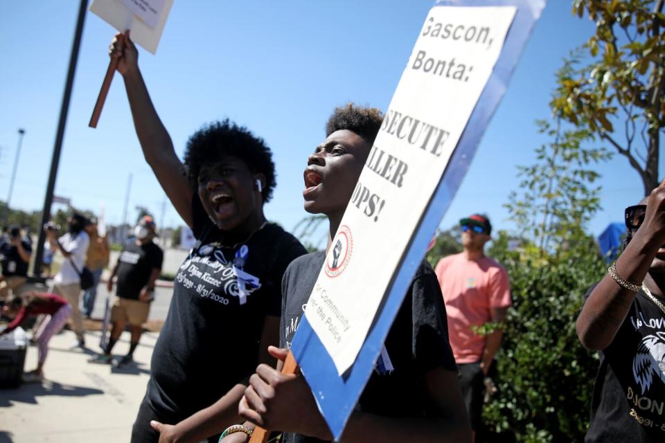 Cousins of Dijon Kizzee protest in front of the South LA Sheriff's Station o