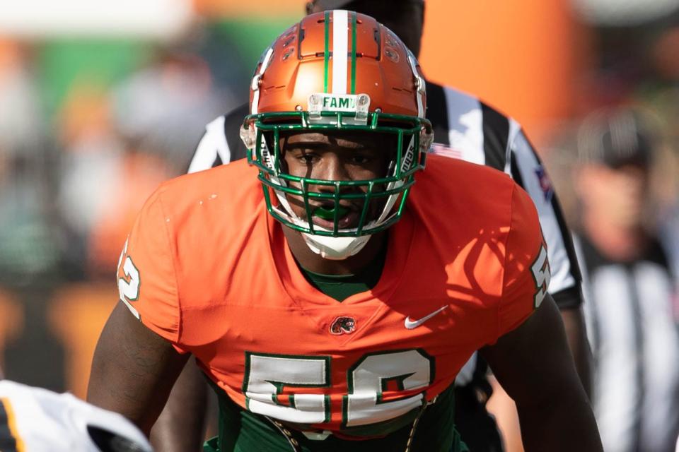 Florida A&M Rattlers linebacker Derrick Mayweather (52) lines up at the line of scrimmage during a game between FAMU and Grambling State University at Bragg Memorial Stadium on FAMU's homecoming Saturday, Oct. 30, 2021.