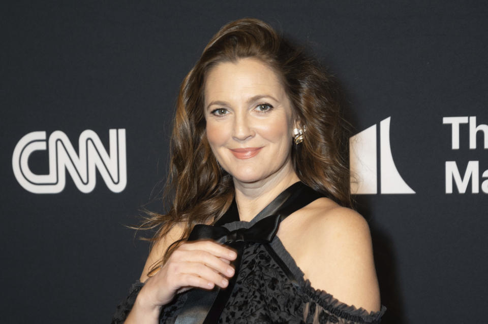 Drew Barrymore arrives on the red carpet for the 24th Annual Mark Twain Prize for American Humor at the Kennedy Center for the Performing Arts on Sunday, March 19, 2023, in Washington. (AP Photo/Kevin Wolf)