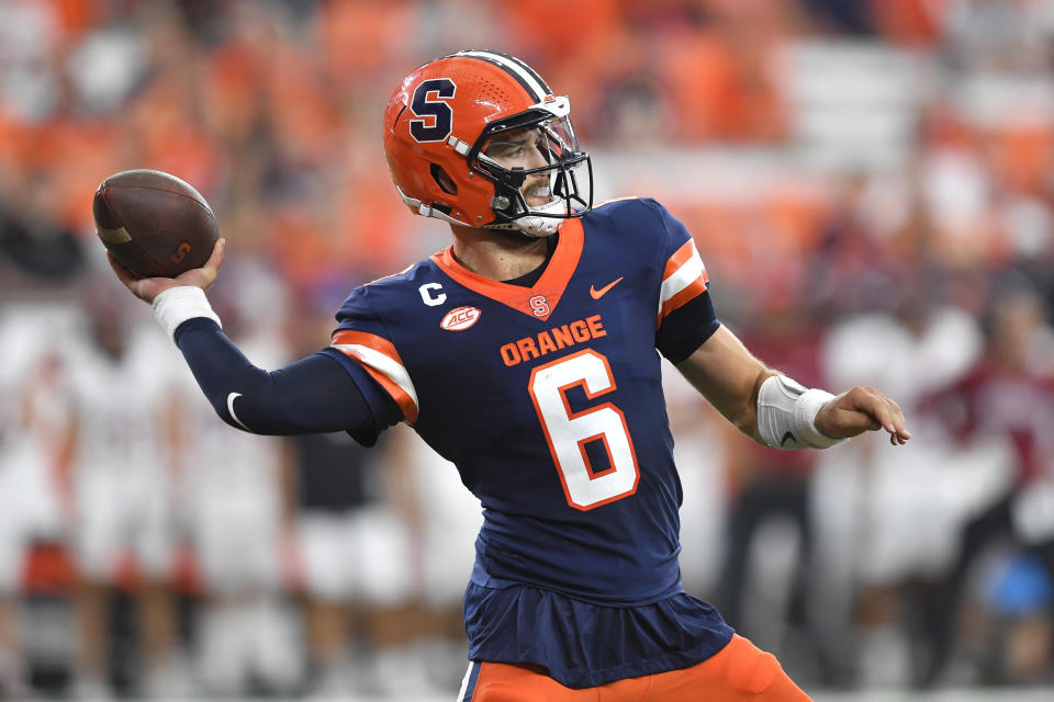 Syracuse quarterback Garrett Shrader throws a pass during the first half of an NCAA college football game against Colgate in Syracuse, N.Y., Saturday, Sept. 2, 2023. (AP Photo/Adrian Kraus)