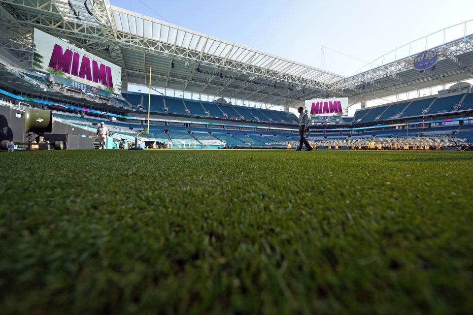 The grass inside Hard Rock Stadium is shown Tuesday, Jan. 28, 2020, in Miami Gardens, Fla., in preparation for the NFL Super Bowl 54 football game. (AP Photo/David J. Phillip)