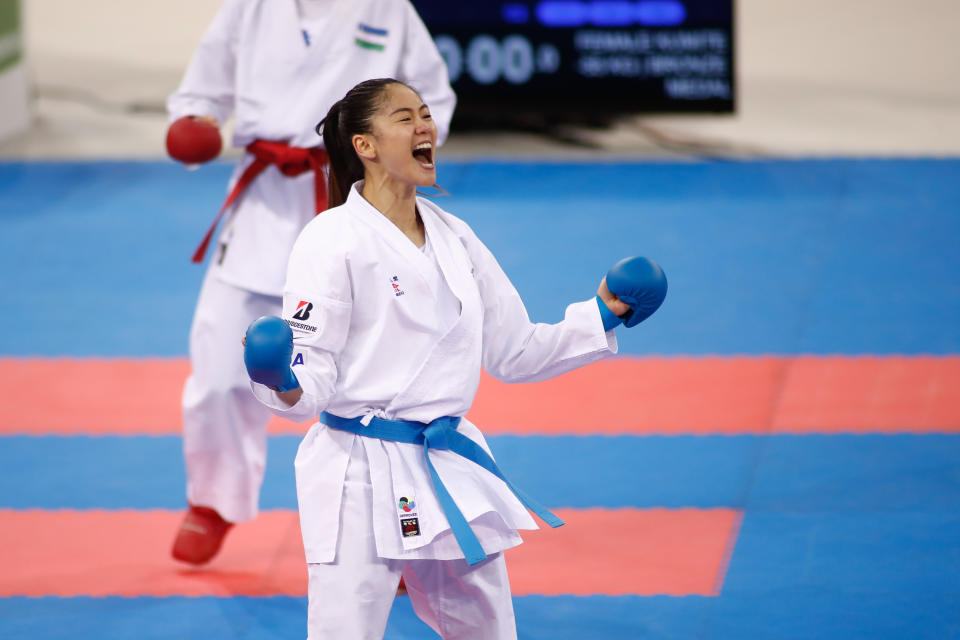 MADRID, SPAIN - DECEMBER 01: Tzu-Yun Wen of China celebrates the victory and the bronce medal won against Sevinch Rakhimova of Uzbekistan during the Premier League of Karate 1 celebrated at Madrid Arena on December 01, 2019 in Madrid, Spain. (Photo by Oscar J. Barroso / AFP7 / Europa Press Sports via Getty Images)