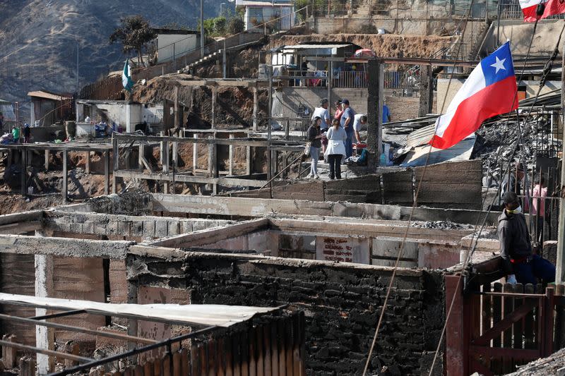 Remains of destroyed homes after fire pictured following spread of wildfires in Valparaiso