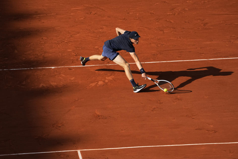 Italy's Jannik Sinner plays a return to Spain's Rafael Nadal during their fourth round match on day 9, of the French Open tennis tournament at Roland Garros in Paris, France, Monday, June 7, 2021. (AP Photo/Michel Euler)