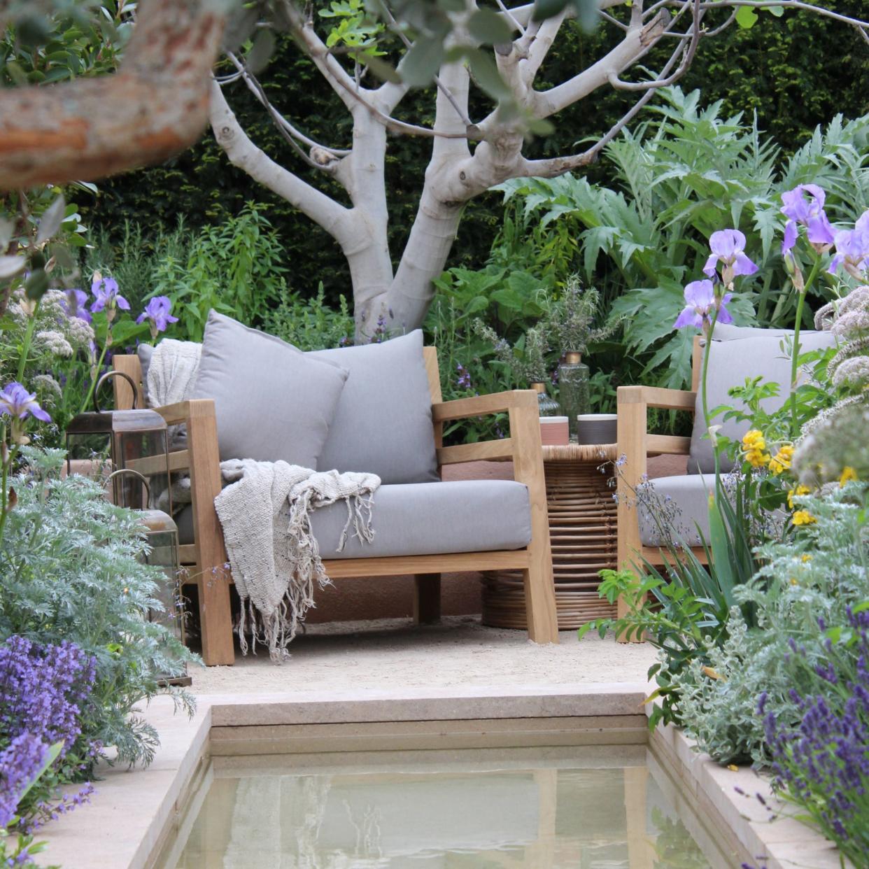  Water feature, concrete pond, at RHS Chelsea Flower Show. 