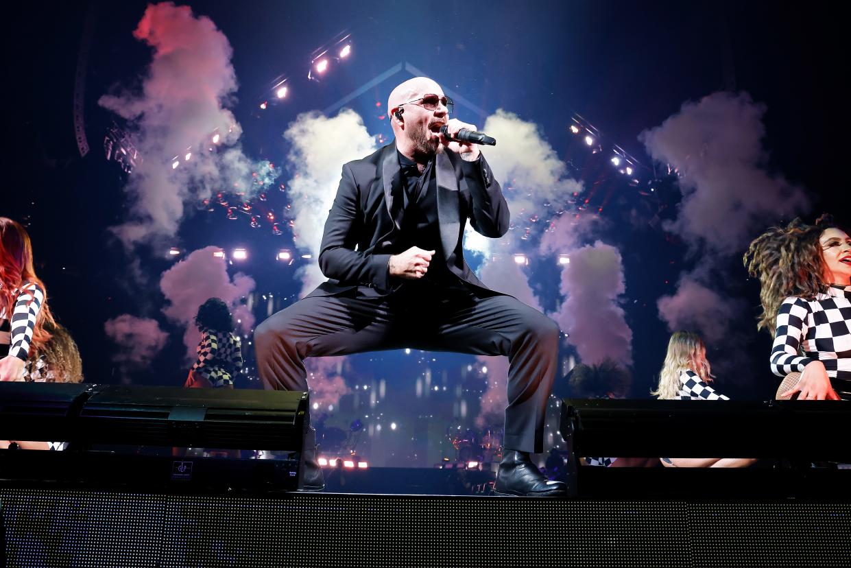 Pitbull performs onstage during The Trilogy Tour at Capital One Arena on Oct. 14, 2023 in Washington, D.C.