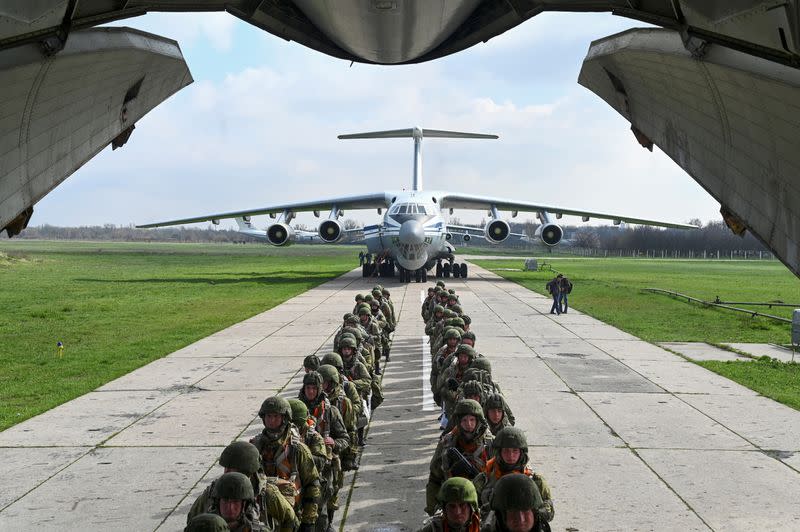 Russian paratroopers take part in drills at a military aerodrome in Taganrog