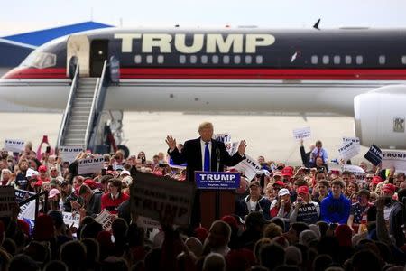 U.S. Republican presidential candidate Donald Trump speaks at Dayton International Airport in Dayton, Ohio March 12, 2016. REUTERS/Aaron P. Bernstein