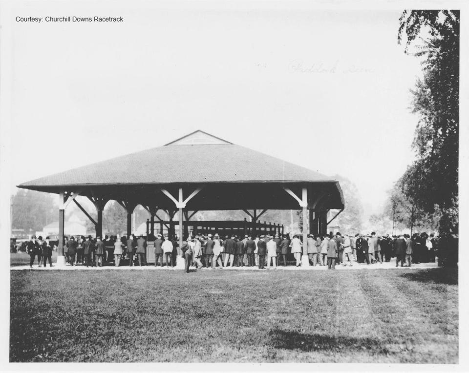 The wooden paddock, which made its debut in time for the 29th Kentucky Derby in May 1903, is seen in this photograph dated sometime between 1912-1919. It would stand until it was replaced with a larger steel paddock in 1923.
