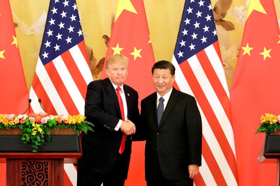 PHOTO: In this Nov. 9, 2017, file photo, President Donald Trump and Xi Jinping, China's president, shake hands during a news conference at the Great Hall of the People in Beijing. (Bloomberg via Getty Images, FILE)