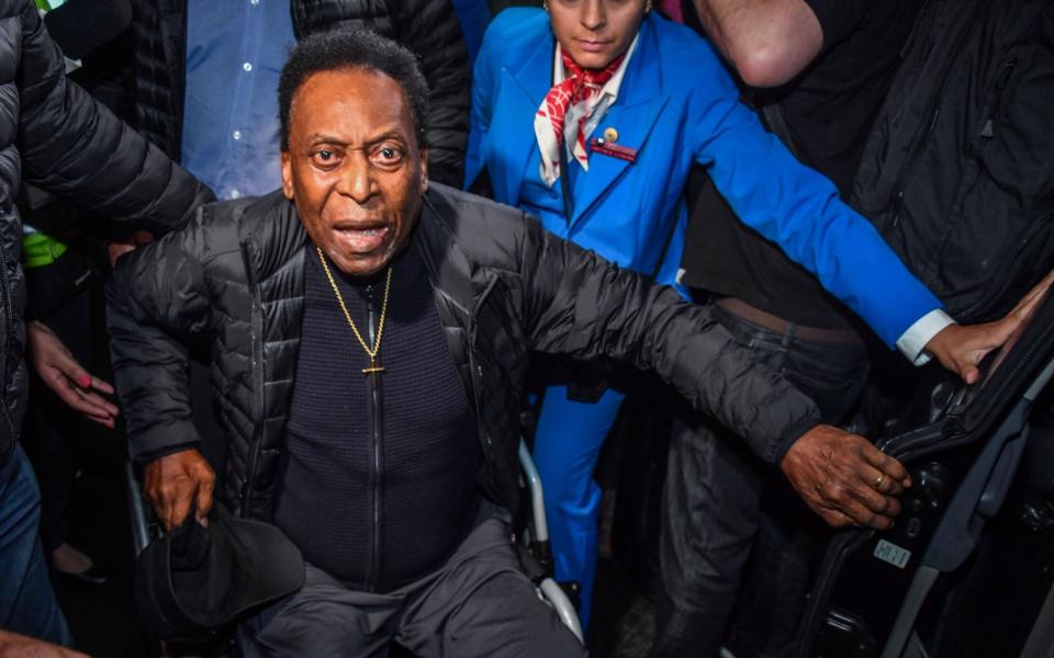 Pele, arrives at Guarulhos International Airport, in Guarulhos some 25km from Sao Paulo, Brazil - Pele 'fine' following concerns about his health - GETTY IMAGES