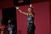 Katherine Elizabeth Nye of the United States reacts after her final lift in the women's 76kg weightlifting event, at the 2020 Summer Olympics, Sunday, Aug. 1, 2021, in Tokyo, Japan. (AP Photo/Luca Bruno)