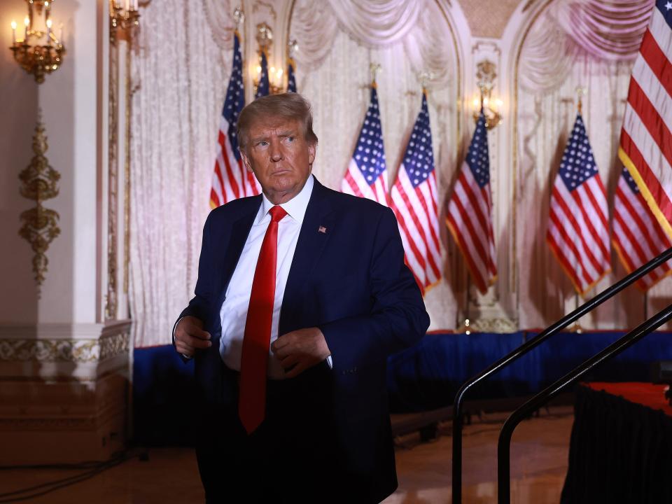 Former U.S. President Donald Trump leaves the stage after speaking during an event at his Mar-a-Lago home on November 15, 2022 in Palm Beach, Florida.