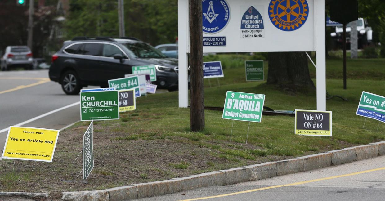 Political signs are seen in the junction of York Street in Route 1 in York as voting day approaches.