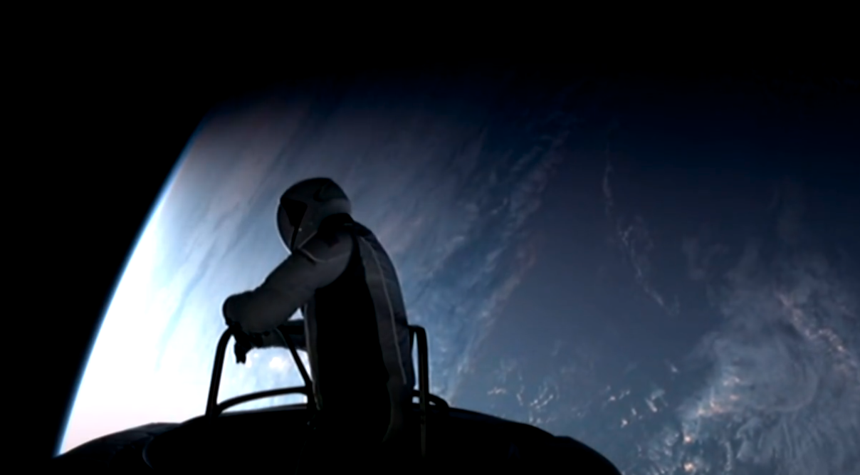 The SpaceX crew fully open the hatch of the Dragon spacecraft, giving a stunning view of Earth. (Reuters)