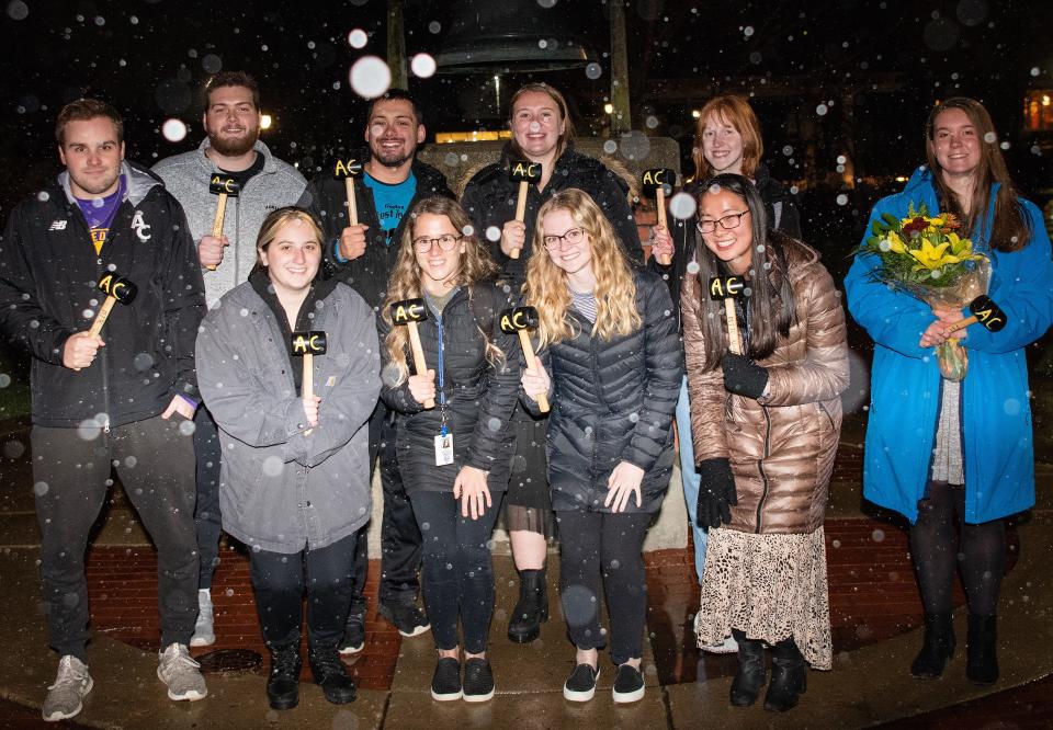 Adrian College teacher education students stand together during a Nov. 16, 2022, ceremony recognizing them for passing the State of Michigan MTTC test, also known as the Michigan Tests for Teacher Certification. Students in the photo are, front row from left,  Joey Patterson, Cassidy Likens, Kennady McClellan, Jordan Cooper, Grace VanKirk and Kayley Craig. In the back row, are, Jayden Cronk, Garrett Schermerhorn, Olivia Vasquez and Jillian Schutte.