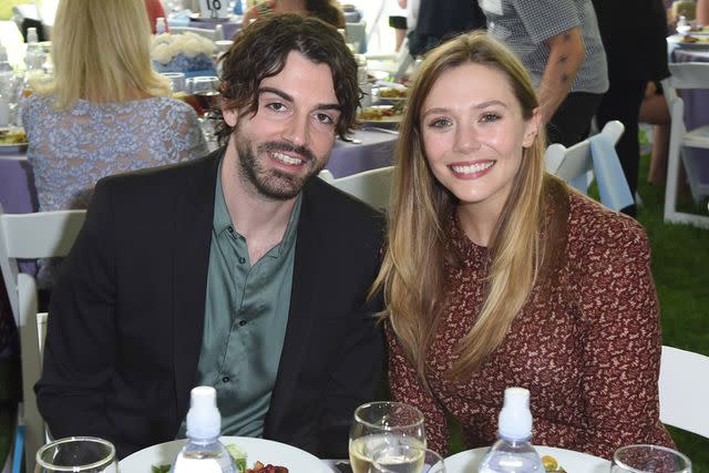 Vivien Killilea/Getty Robbie Arnett and Elizabeth Olsen