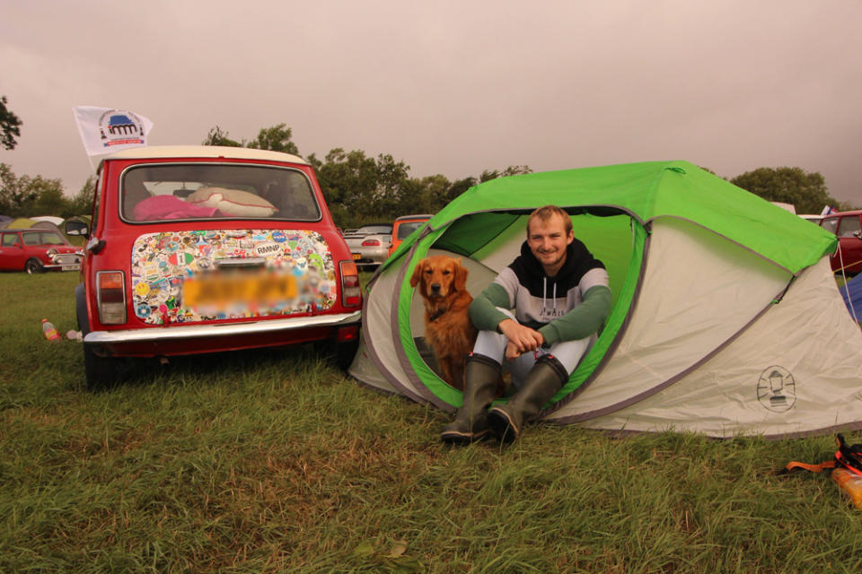 Kieran Field, 27, with their dog Freddie, used to camp in a tent before getting their campervan (Collect/PA Real Life)