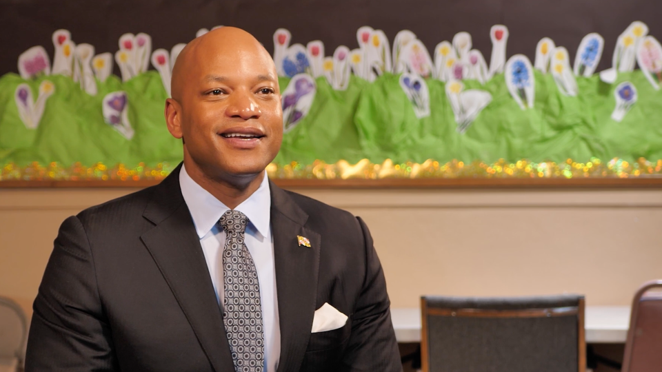 Gov. Wes Moore speaks to filmmakers about the house on Jonathan Street and its significance to local history.