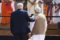 India's Prime Minister Narendra Modi (R) and US President Donald Trump leave after attending 'Namaste Trump' rally at Sardar Patel Stadium in Motera, on the outskirts of Ahmedabad, on February 24, 2020. (Photo by Money SHARMA / AFP) (Photo by MONEY SHARMA/AFP via Getty Images)