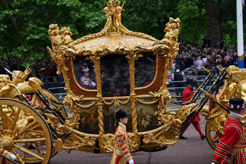 A hologram of Queen Elizabeth II during her coronation in the Gold State Coach during the Platinum Jubilee Pageant in front of Buckingham Palace, London, on day four of the Platinum Jubilee celebrations. Picture date: Sunday June 5, 2022. (Photo by Yui Mok/PA Images via Getty Images)