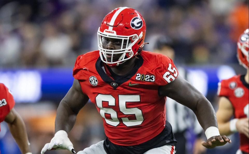 Georgia offensive lineman Amarius Mims blocks against Texas Christian.