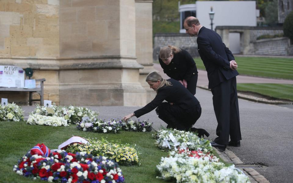 Earl and Countess of Wessex view flowers outside St George's Chapel - Getty Images Europe