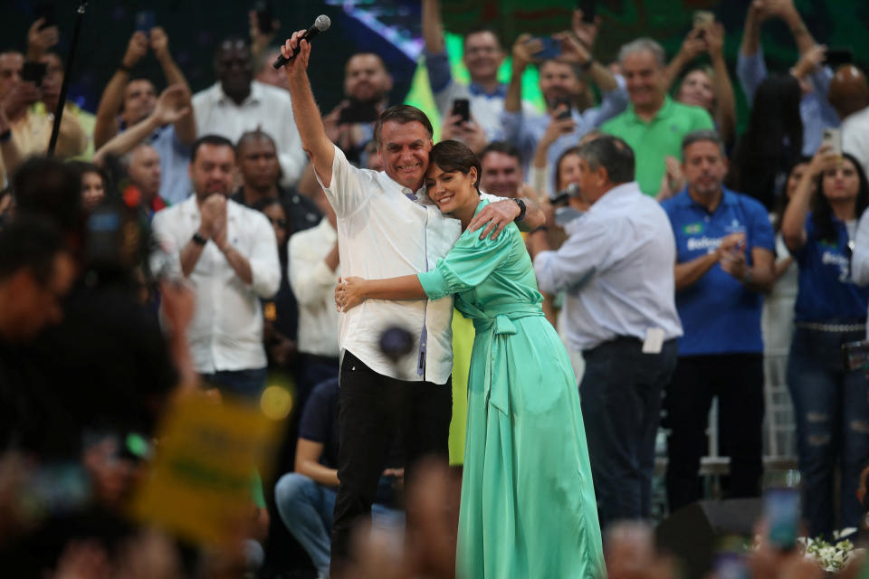 Brazil's President Jair Bolsonaro attends the launching ceremony along with his wife Michelle Bolsonaro to officially become a candidate for the presidential re-election, in Rio de Janeiro, Brazil July 24 2022. REUTERS/Ricardo Moraes