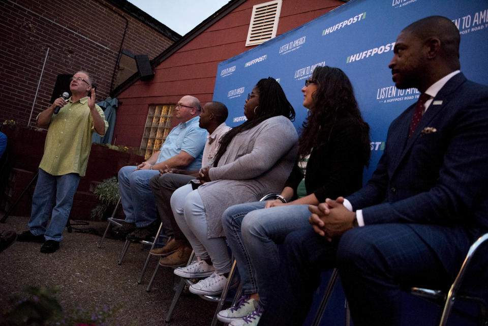 St. Louis American Editorial Director Chris King speaks to police Sgt. Kevin Ahlbrand, left, lawyer Blake Strode, organizer and activist Kayla Reed, Alderwoman Megan E. Green and Rev. Starsky Wilson.