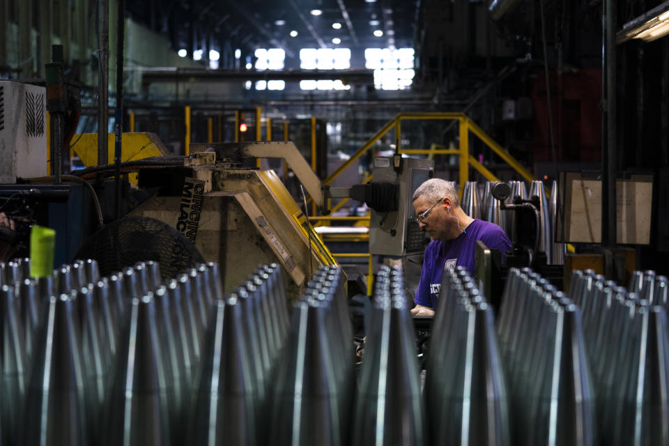 FILE - A steel worker manufactures 155 mm M795 artillery projectiles at the Scranton Army Ammunition Plant in Scranton, Pa., Thursday, April 13, 2023. The Pentagon could get weapons moving to Ukraine within days if Congress passes a long-delayed aid bill. That's because it has a network of storage sites in the U.S. and Europe that already hold the ammunition and air defense components that Kyiv desperately needs. The House approved $61 billion in funding for the war-torn country Saturday, April 20, 2024. (AP Photo/Matt Rourke, File)