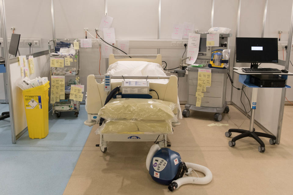 EMBARGOED TO 00.01 WEDNESDAY 01 APRIL Medical equipment is labelled and prepared for use by NHS staff at the ExCel centre in London which is being made into a temporary hospital - the NHS Nightingale hospital, comprising of two wards, each of 2,000 people, to help tackle coronavirus. PA Photo. Picture date: Tuesday March 31, 2020. A total of 1,408 patients have died after testing positive for coronavirus in the UK as of 5pm on Sunday. Photo credit should read: Stefan Rousseau/PA Wire