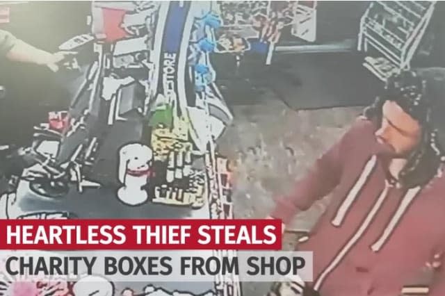 Brazen thief steals two charity collection boxes