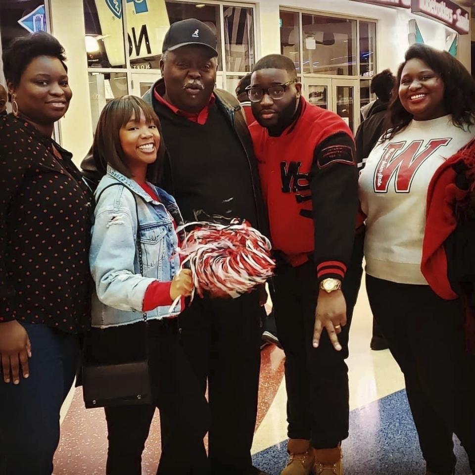 This photo provided by Thesha Woodley, from left, daughter Cathea, daughter-in-law Amaya, Theophilus Woodley, son Theophilus Linwood and daughter Thesha while attending the CIAA Tournament in Charlotte, N.C., in February 2020. Theophilus Woodley began attending the CIAA Tournament in 1971, a year after graduating from Winston-Salem State University, and had gone for 45 consecutive years until missing the event in 2022. Thesha will represent the family this year as the CIAA begins its second year in Baltimore on Tuesday, Feb. 21, 2023. (Courtesy photo Thesha Woodley via AP)